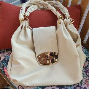 Elegant Cream Handbag with Gold Accents